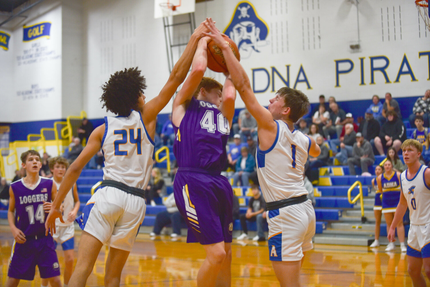 Ethan Thayer takes the ball to the rim during  Adna's 78-37 win over Onalaska Dec. 7.